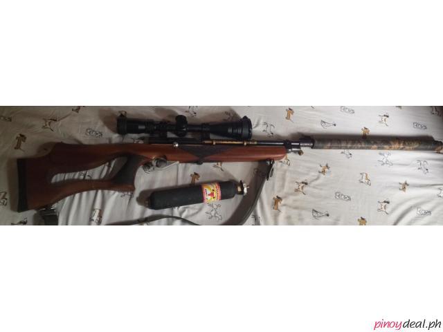 For sale co2 airgun with tank and scope and in good condition first owner